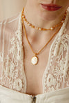 Carved Shell Cross Pendant