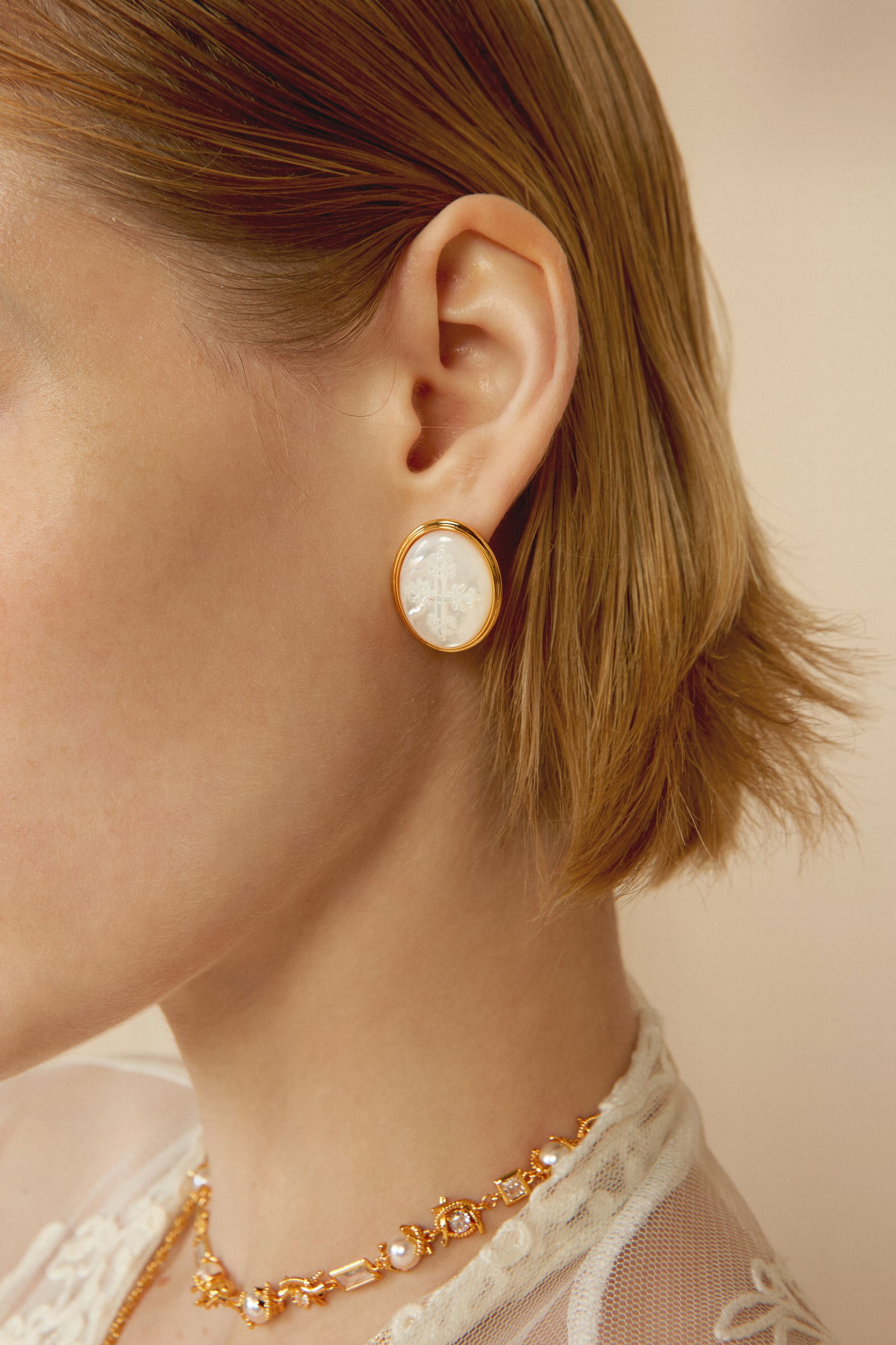 Carved Shell Cross Studs